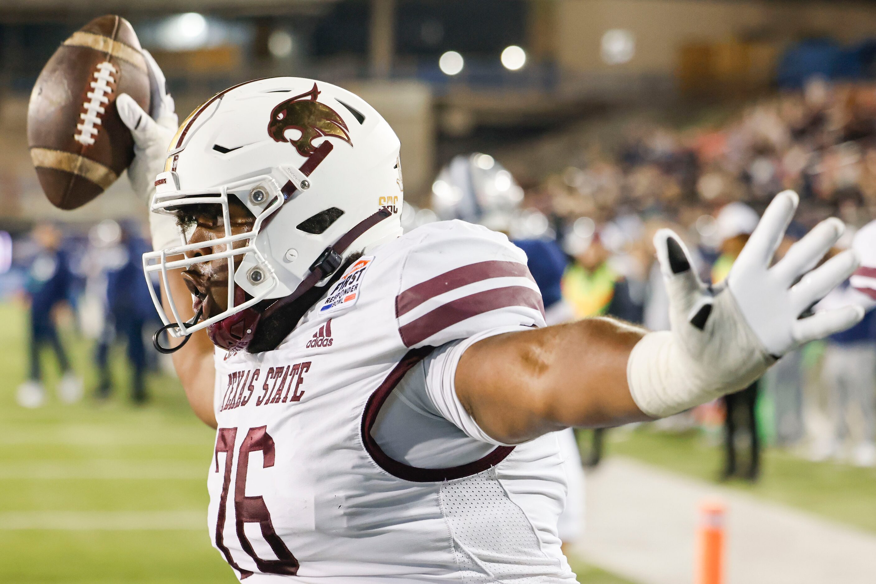 Texas State offensive lineman Nash Jones (76) celebrates a touchdown against the Rice during...