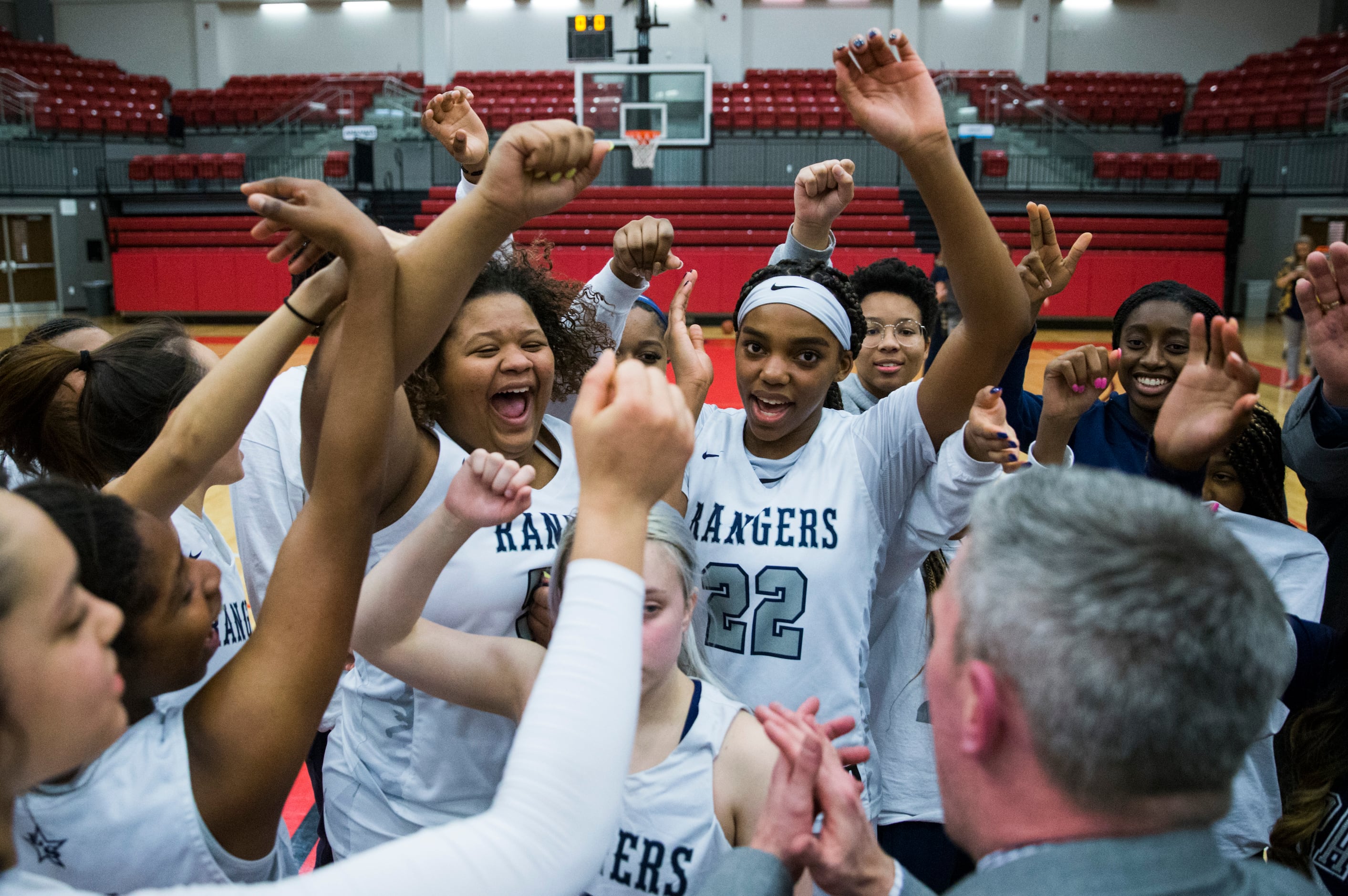 Frisco Lone Star celebrates a 46-40 win after a Class 5A area-round playoff girls basketball...