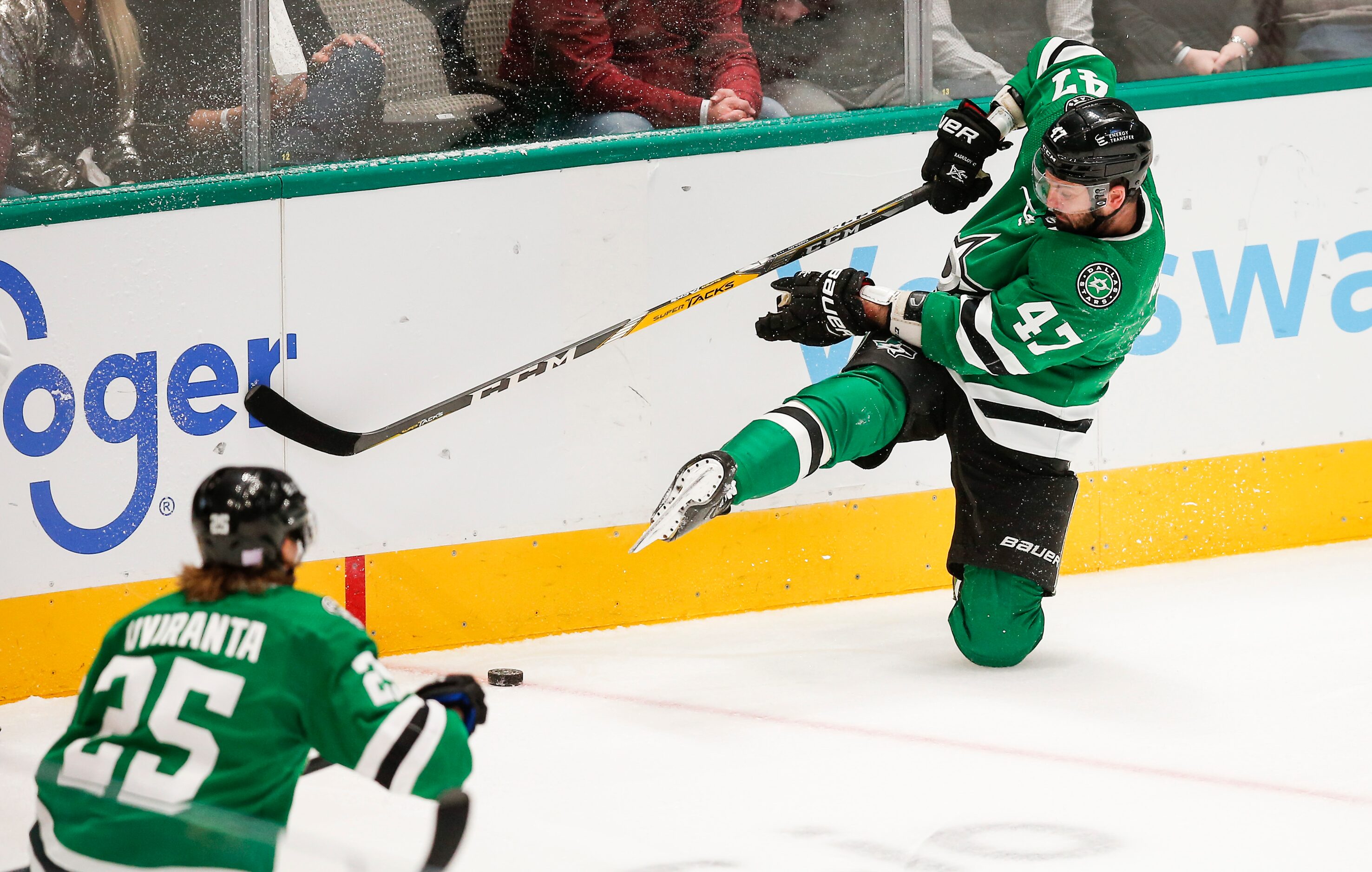 Dallas Stars forward Joel Kiviranta (25) looks on as forward Alexander Radulov (47) plays...