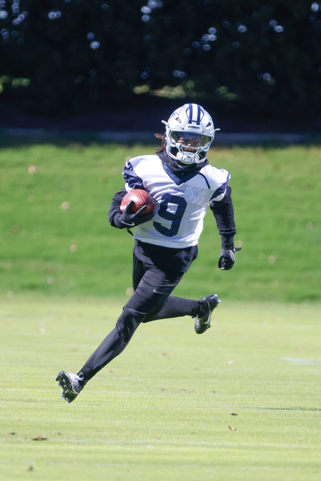 Dallas Cowboys wide receiver KaVontae Turpin runs with the ball during a team practice on...