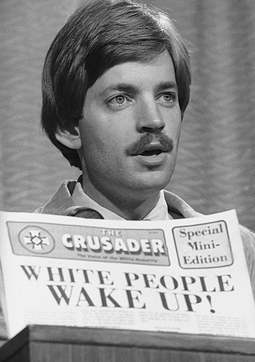  David Duke, Grand Imperial Wizard of the Ku Klux Klan, talks to members of the press in...