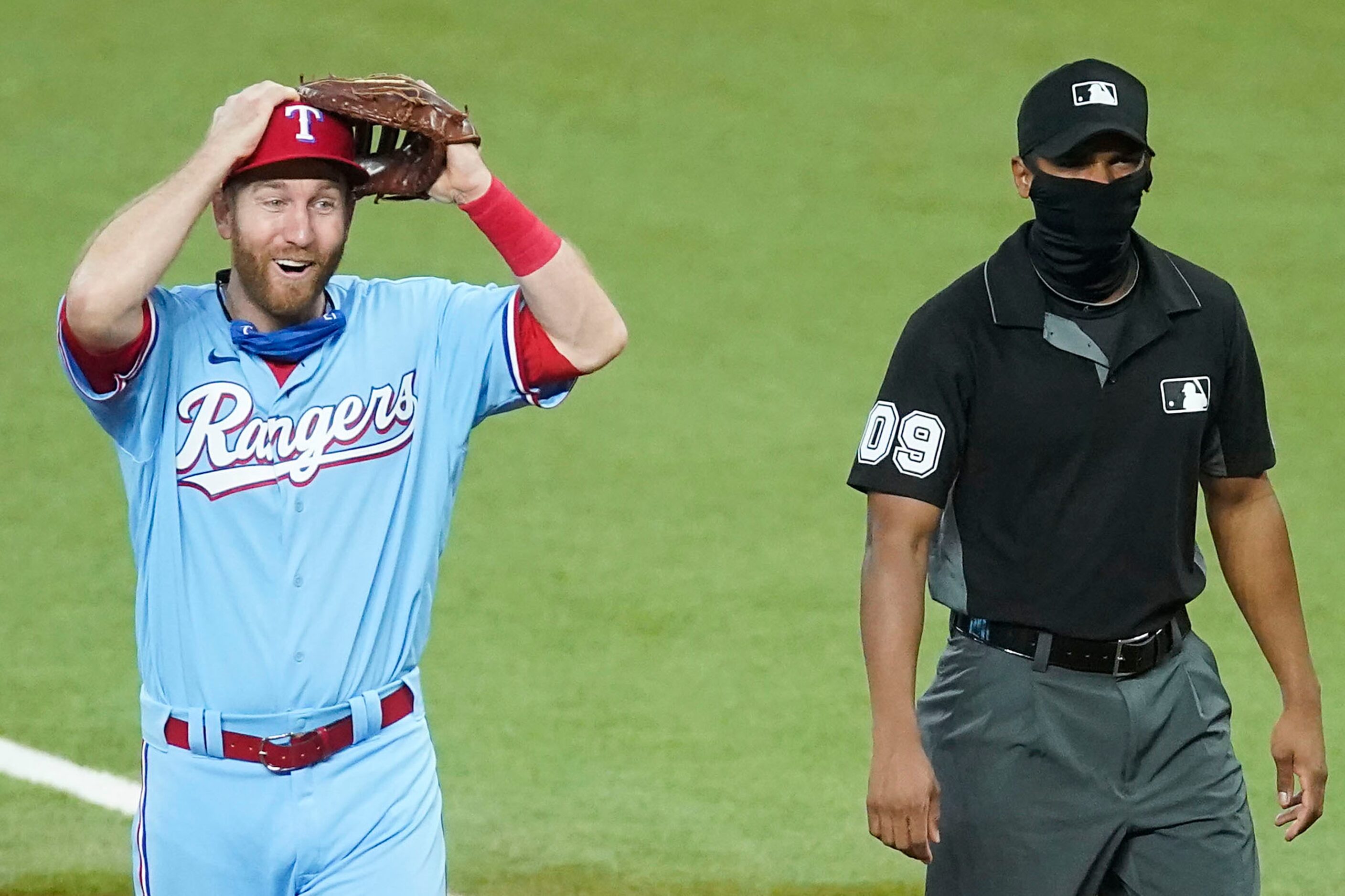 Texas Rangers first baseman Todd Frazier reacts after Los Angeles Angels center fielder Jo...