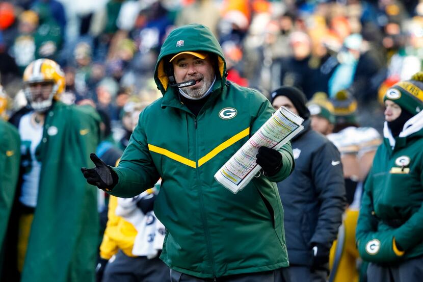 CHICAGO, IL - DECEMBER 18:  Head coach Mike McCarthy of the Green Bay Packers reacts on the...