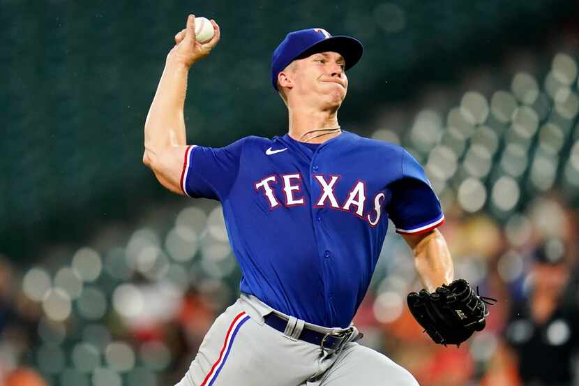 Texas Rangers starting pitcher Glenn Otto throws a pitch to the Baltimore Orioles during the...