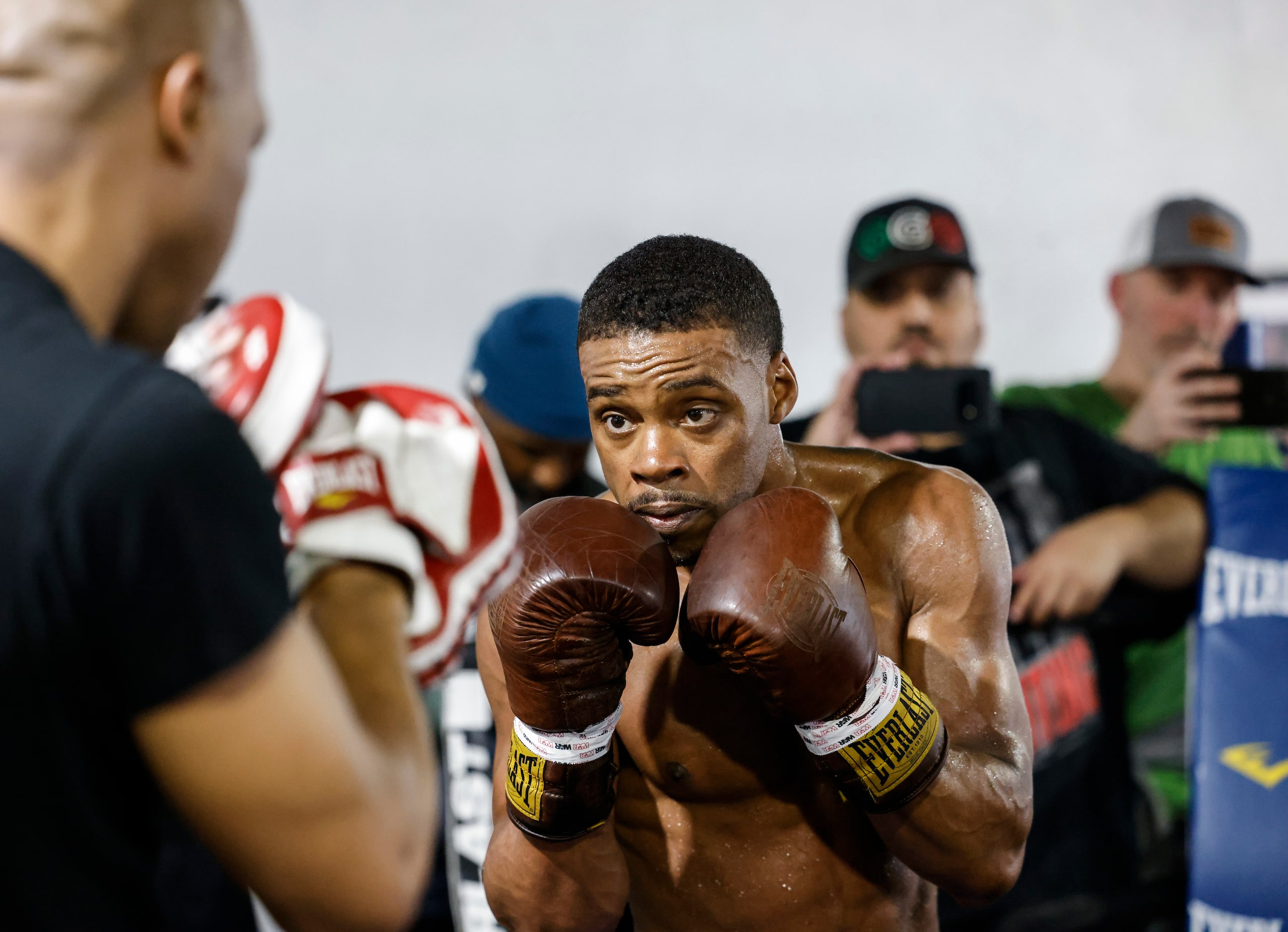 Errol Spence Jr. of Desoto practices with his coach Derrick James during a media workout on...