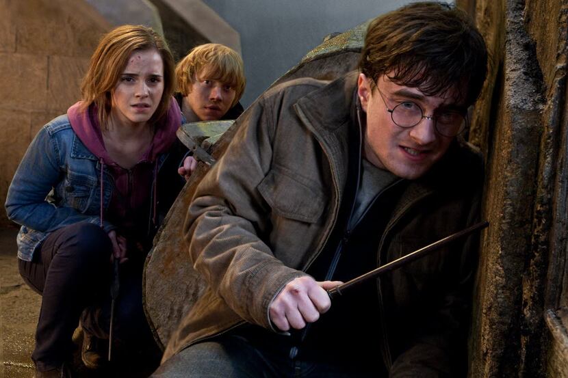 In this film publicity image released by Warner Bros. Pictures, from left, Emma Watson,...