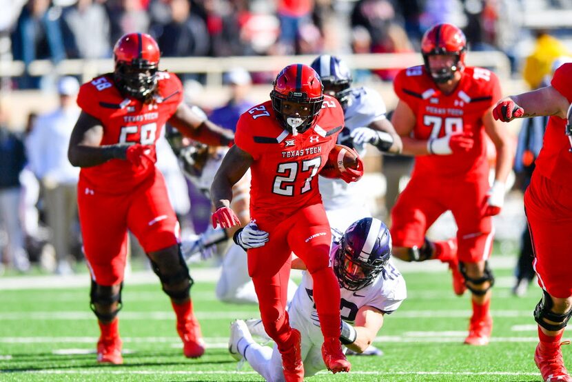 LUBBOCK, TX - NOVEMBER 18: Demarcus Felton #27 of the Texas Tech Red Raiders breaks away for...