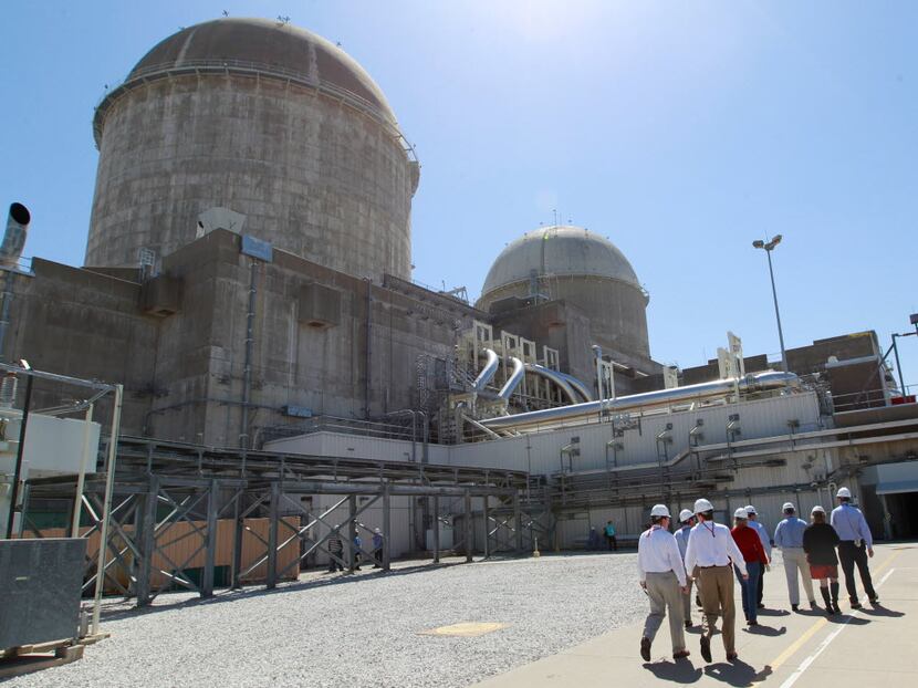 U.S. Rep. Joe Barton  and members of the media tour the Comanche Peak Nuclear Power Plant in...