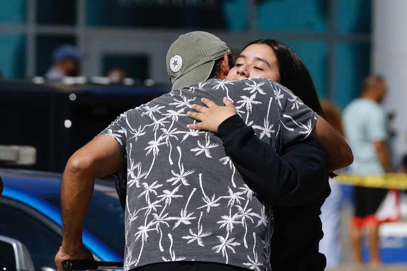 A Timberview High School student gets a hug outside of the Mansfield ISD Center for The...