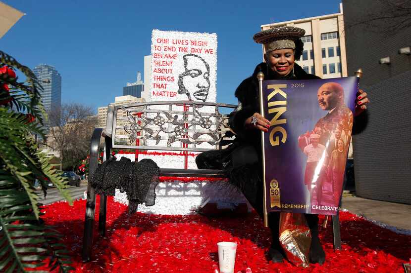 Clara Brown Trimble unfurls a Martin Luther King poster prior to  the MLK parade in Dallas,...