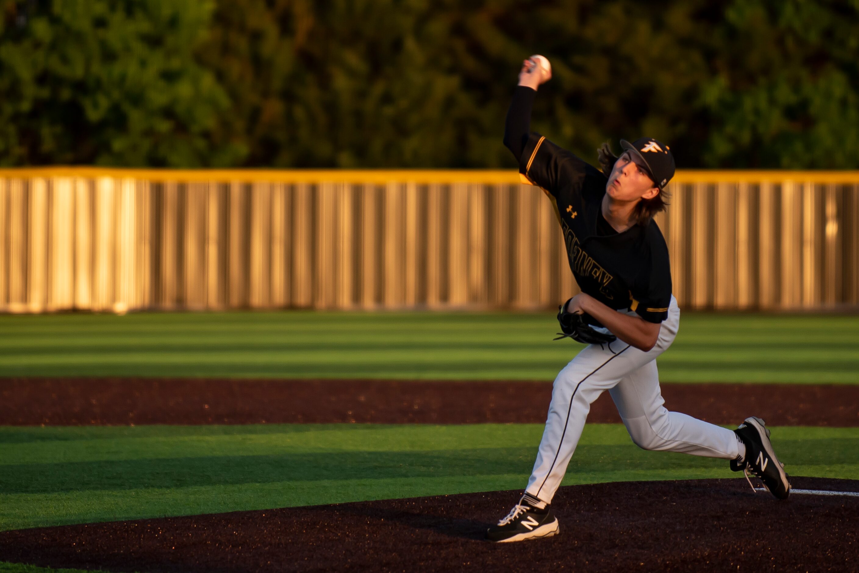 Forney pitcher Aiden Sims (4) delivers a pitch during a baseball game between Crandall High...