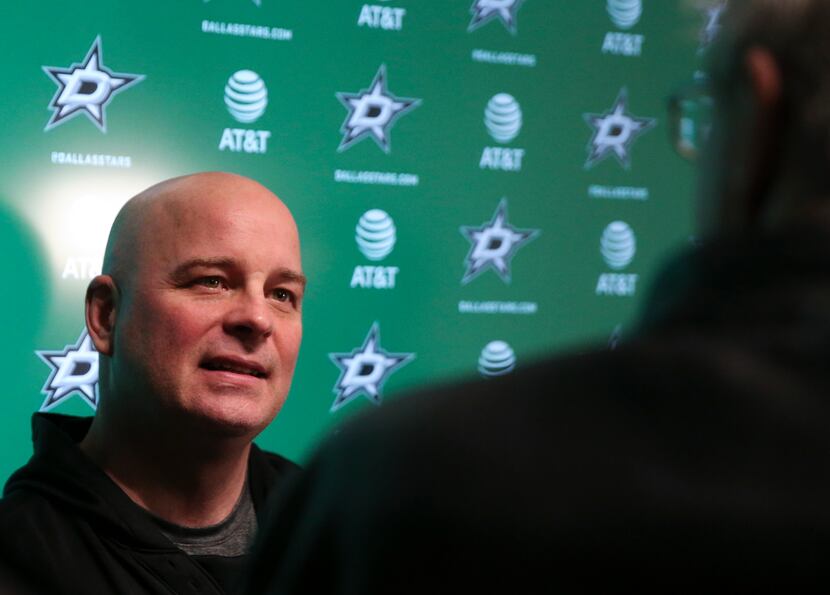 FILE - Jim Montgomery speaks to the media following a Stars practice at Comerica Center in...