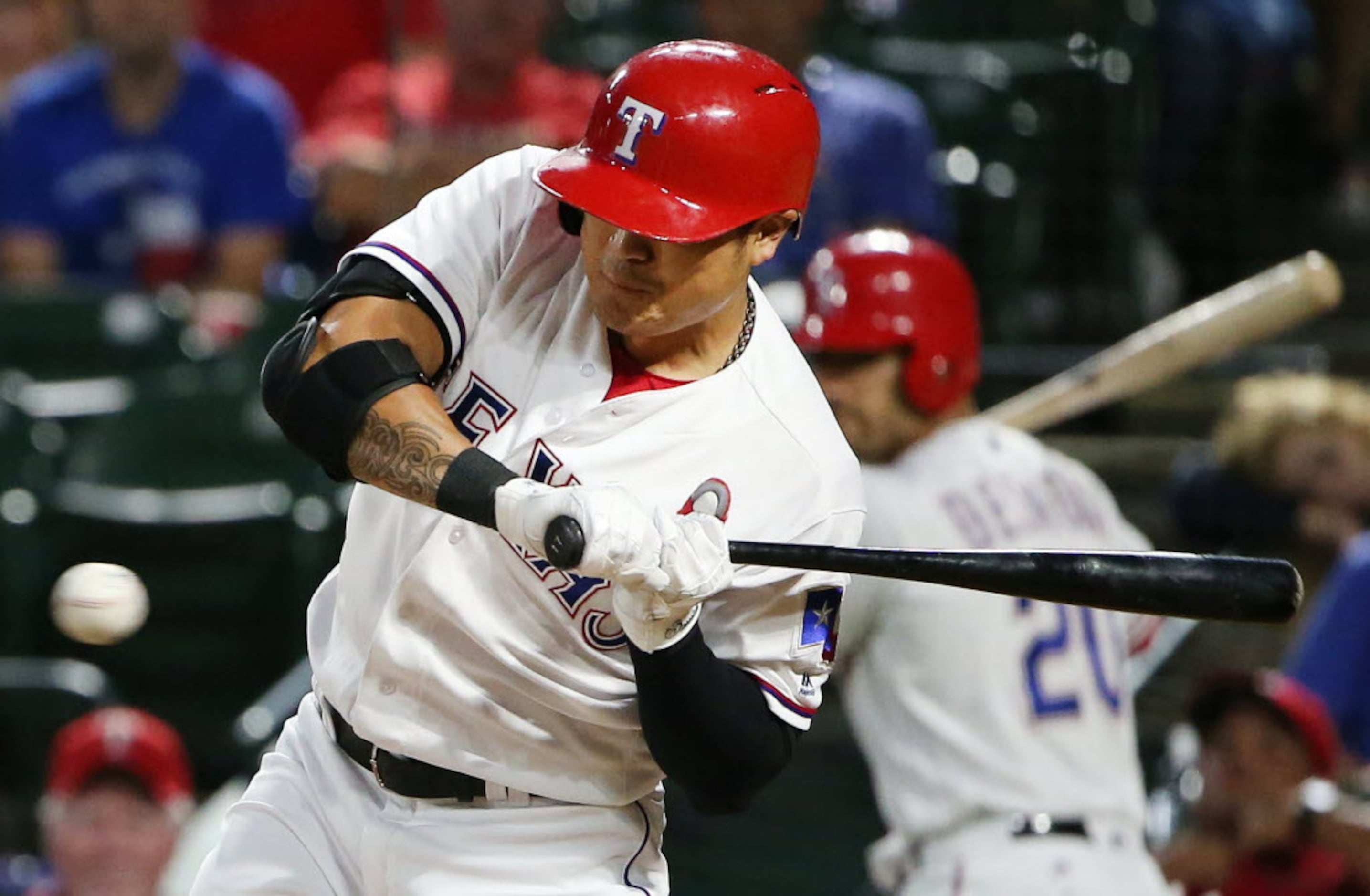 Rangers' Shin-Soo Choo breaks left arm on hit by pitch vs. A's