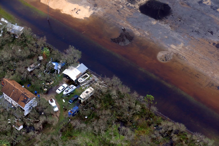 This aerial photo shows a view of damage in the wake of Hurricane Harvey, Monday, Aug. 28,...