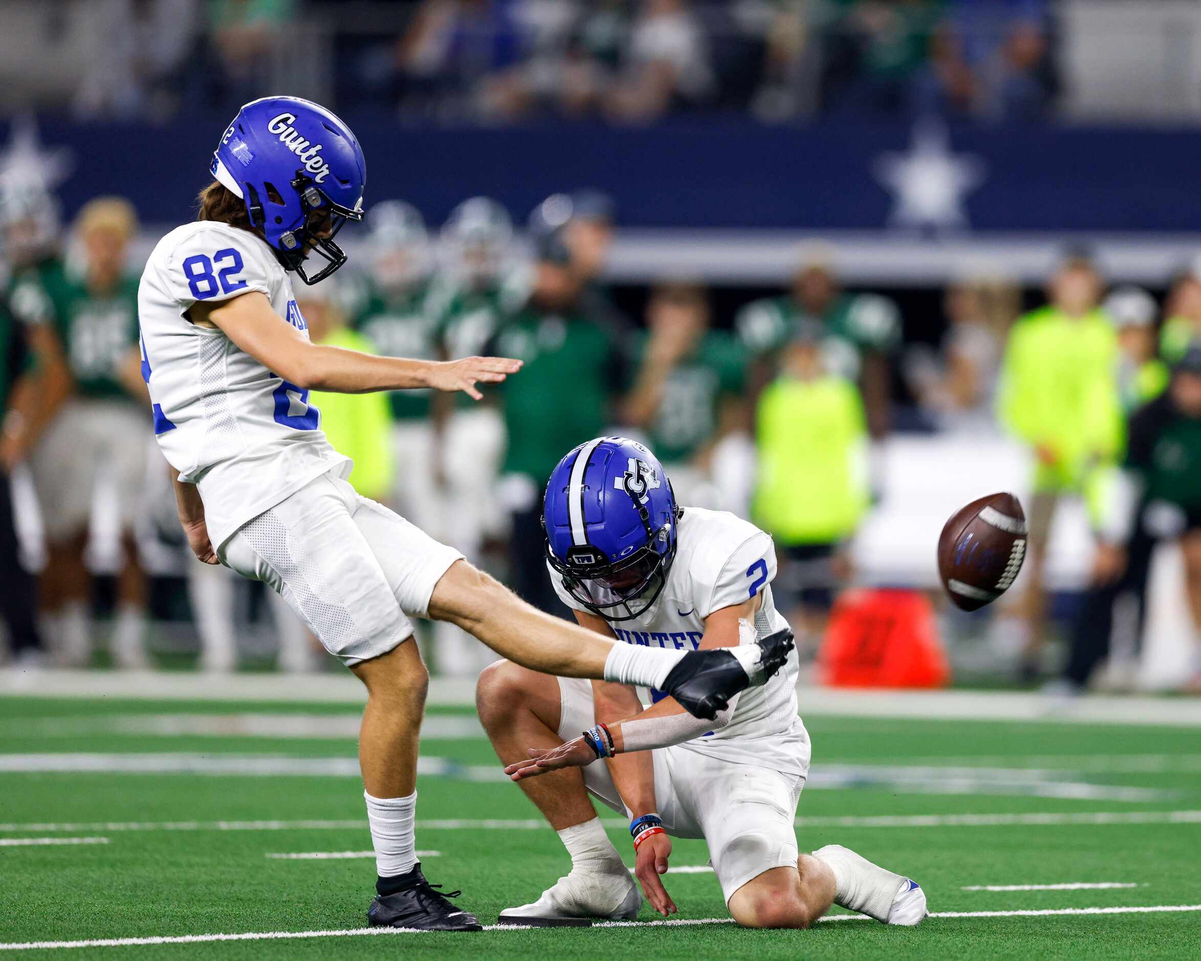 Gunter kicker Logan Hubbard (82) converts an extra point during the first quarter of their...