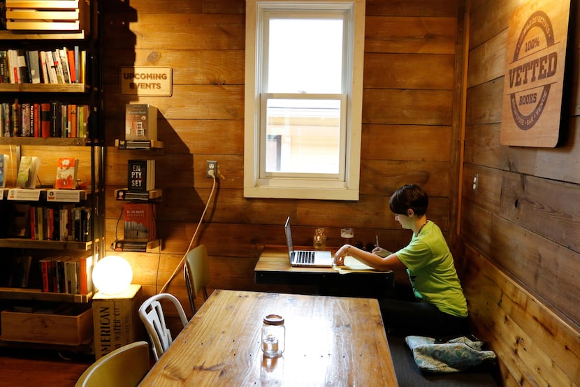 Jessica Darst works on her computer at The Wild Detectives. 