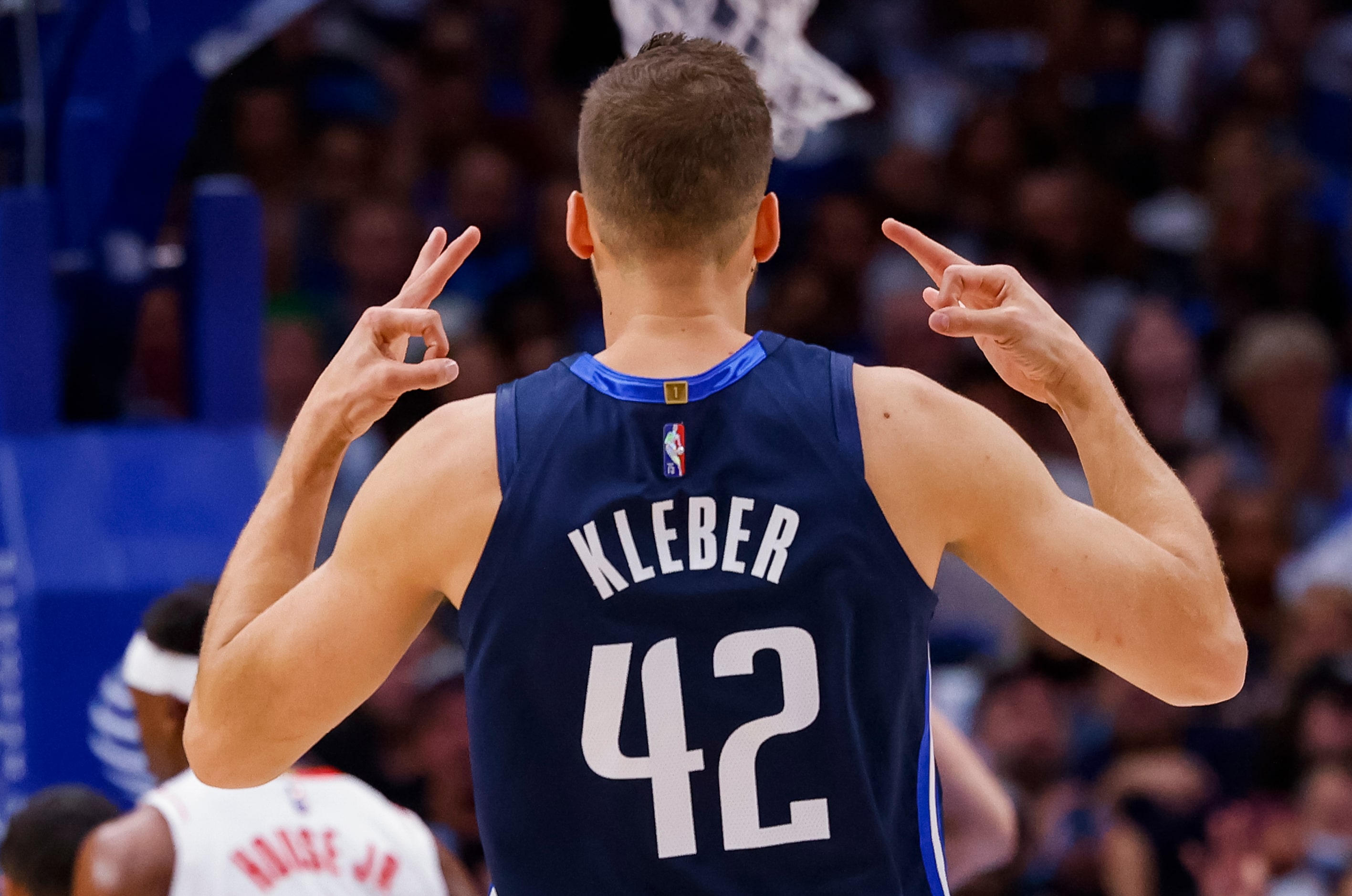 Dallas Mavericks forward Maxi Kleber (42) celebrates a shot during the first quarter of the...