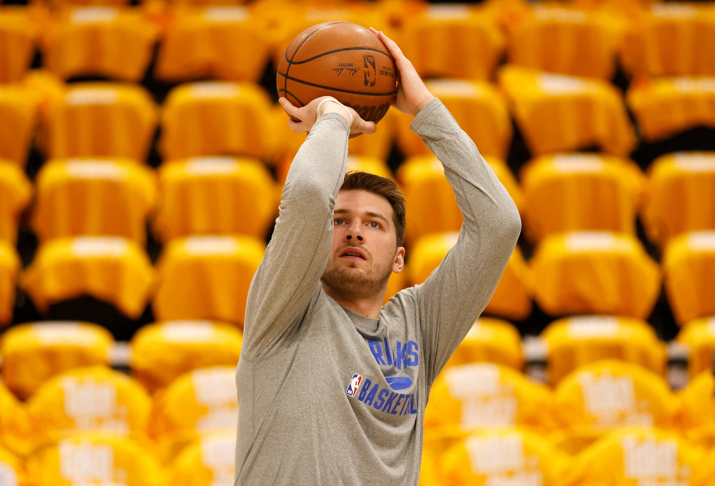 Dallas Mavericks guard Luka Doncic (77) shoots during warmups before game 4 of an NBA...