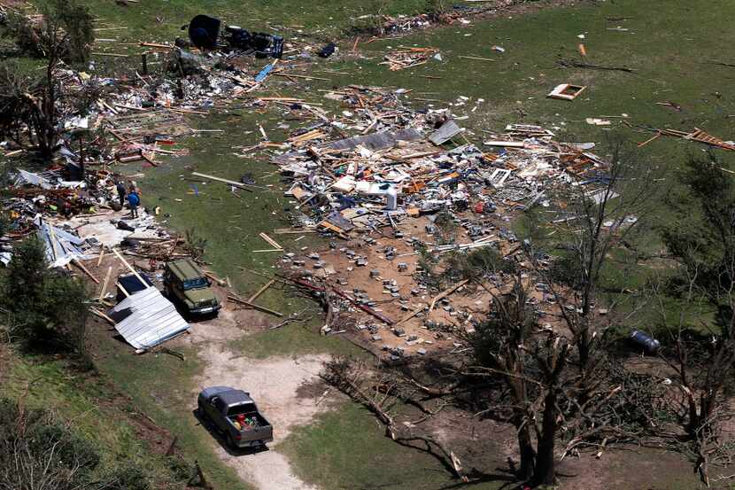A destroyed home is seen from the air in Canton, Texas, Sunday, April 30, 2017. Severe...