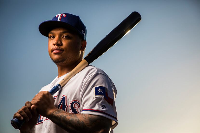 Texas Rangers left fielder Willie Calhoun poses for a photo during Spring Training picture...
