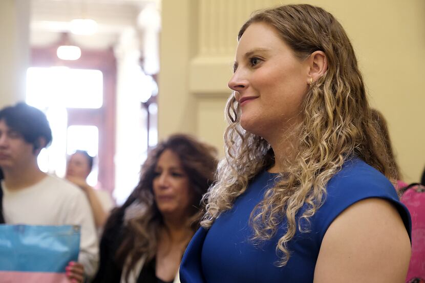 Callie Butcher, of Dallas, listened to speakers in the Texas Capitol rotunda for Transgender...