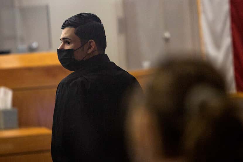 Defendant Ruben Alvarado stands as the jurors leave the courtroom in his trial for the...