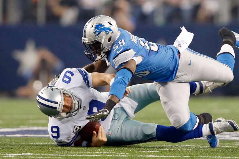 Detroit Lions middle linebacker Tahir Whitehead sacks Dallas Cowboys quarterback Tony Romo.