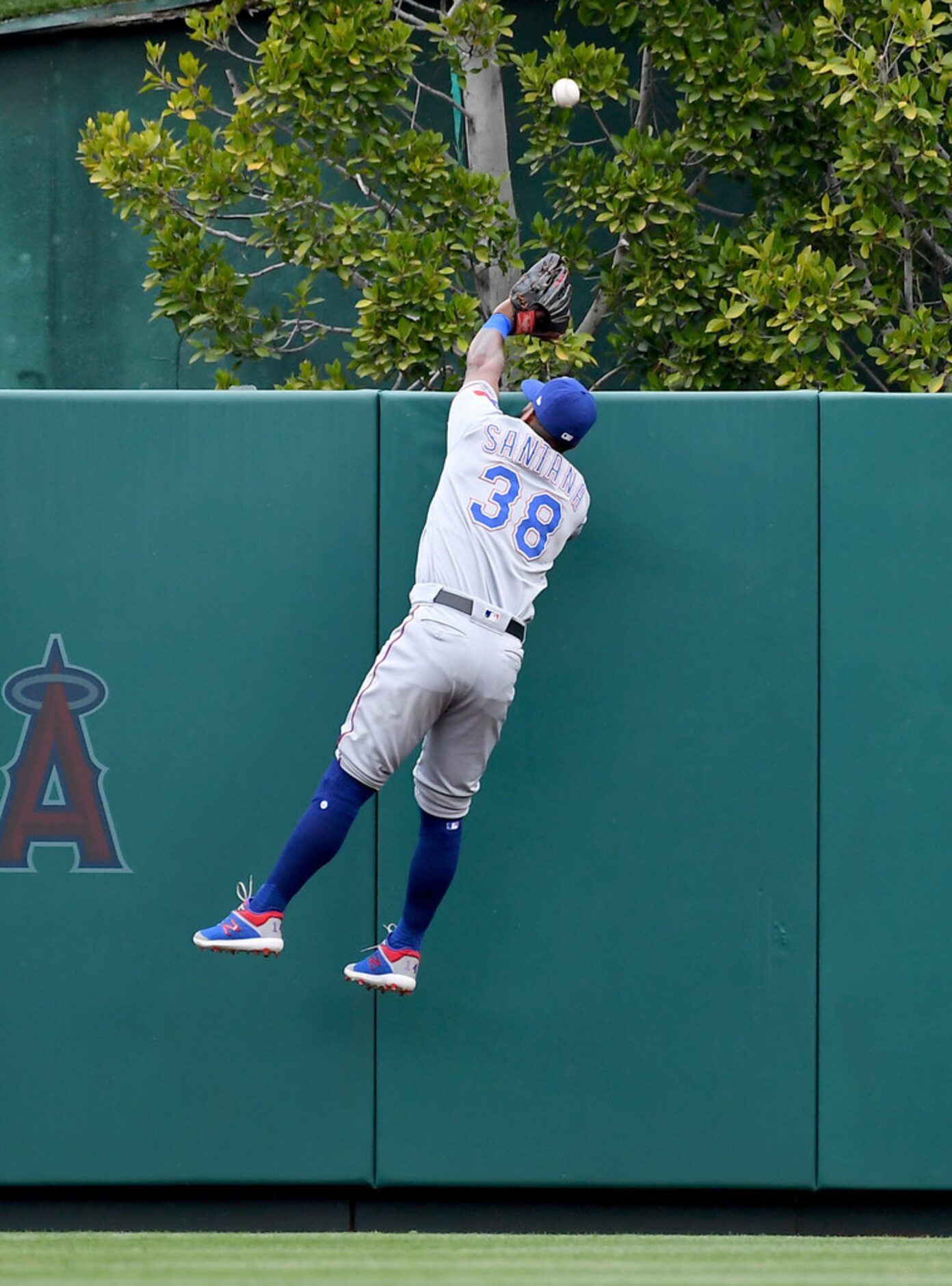 ANAHEIM, CA - MAY 26: Danny Santana #38 of the Texas Rangers can't reach the solo home run...