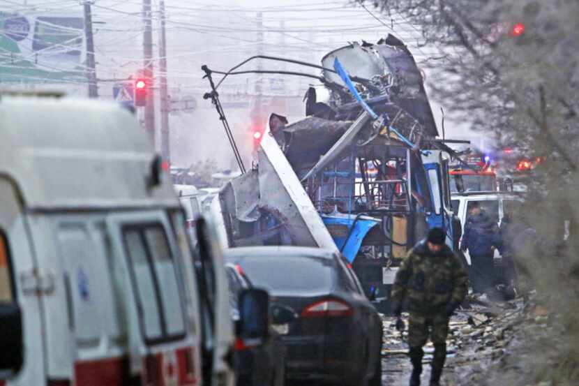 Authorities examined the scene after a bomb blast tore through a bus in  Volgograd, Russia,...