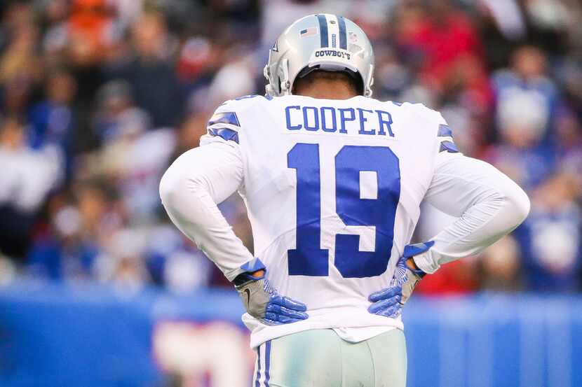 Dallas Cowboys wide receiver Amari Cooper (19) walks back into the huddle in the second half...