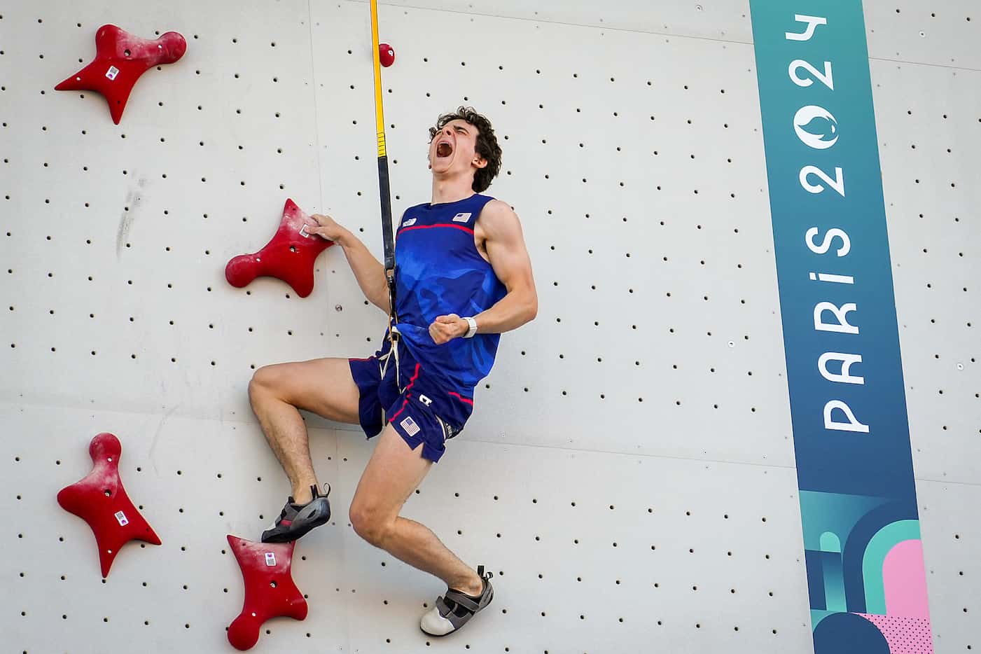 Sam Watson of the United States celebrates after breaking his own world record with a time...
