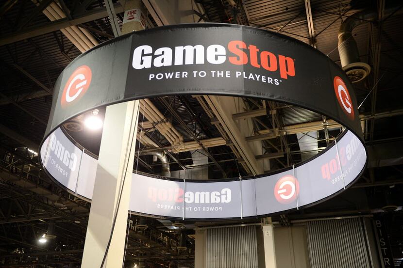 FILE - This Aug. 28, 2013, file photo shows signage at GameStop Vegas 2013, in Las Vegas....