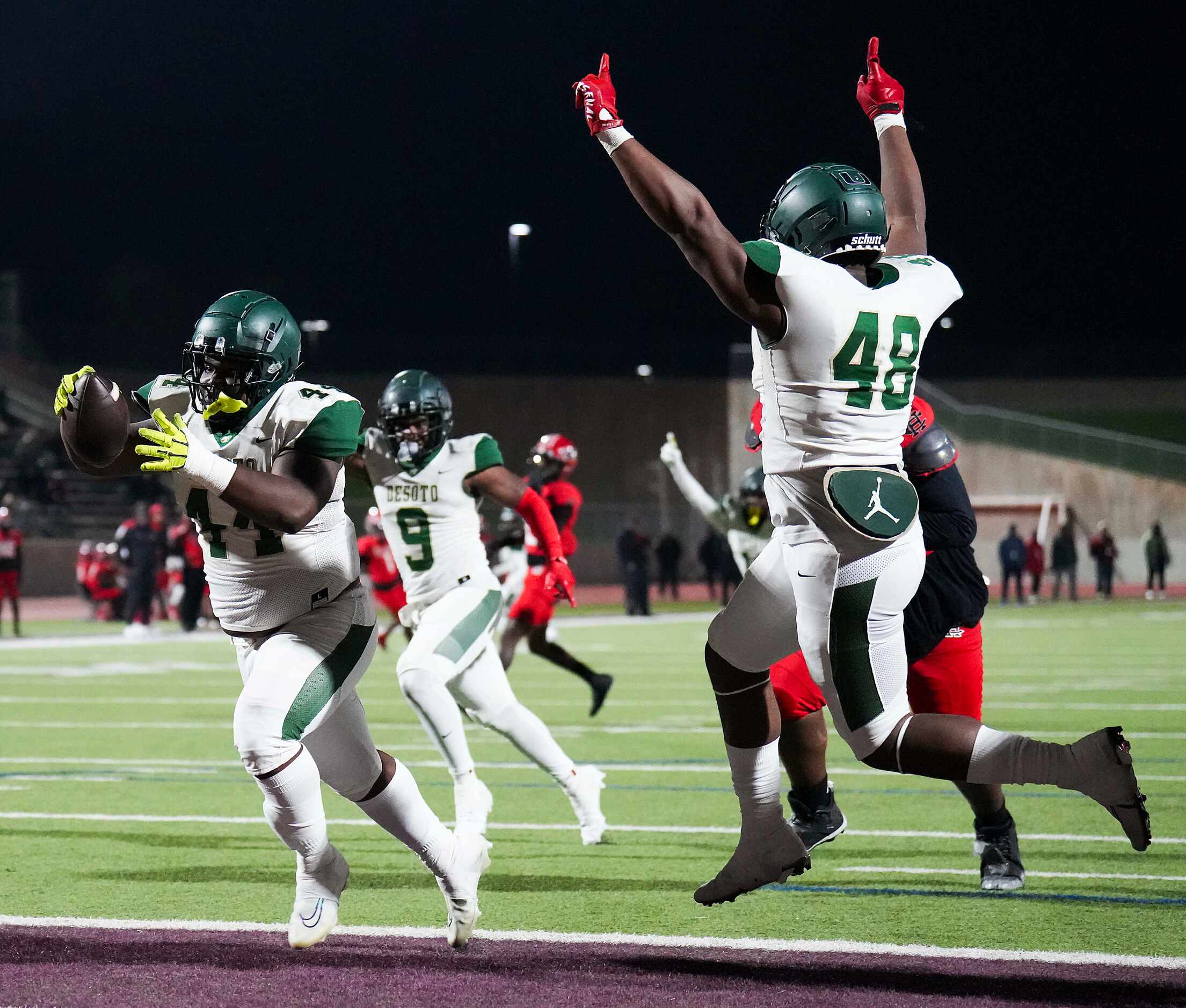 DeSoto defensive lineman Marshall Kirven (44) returns an interception for a touchdown during...