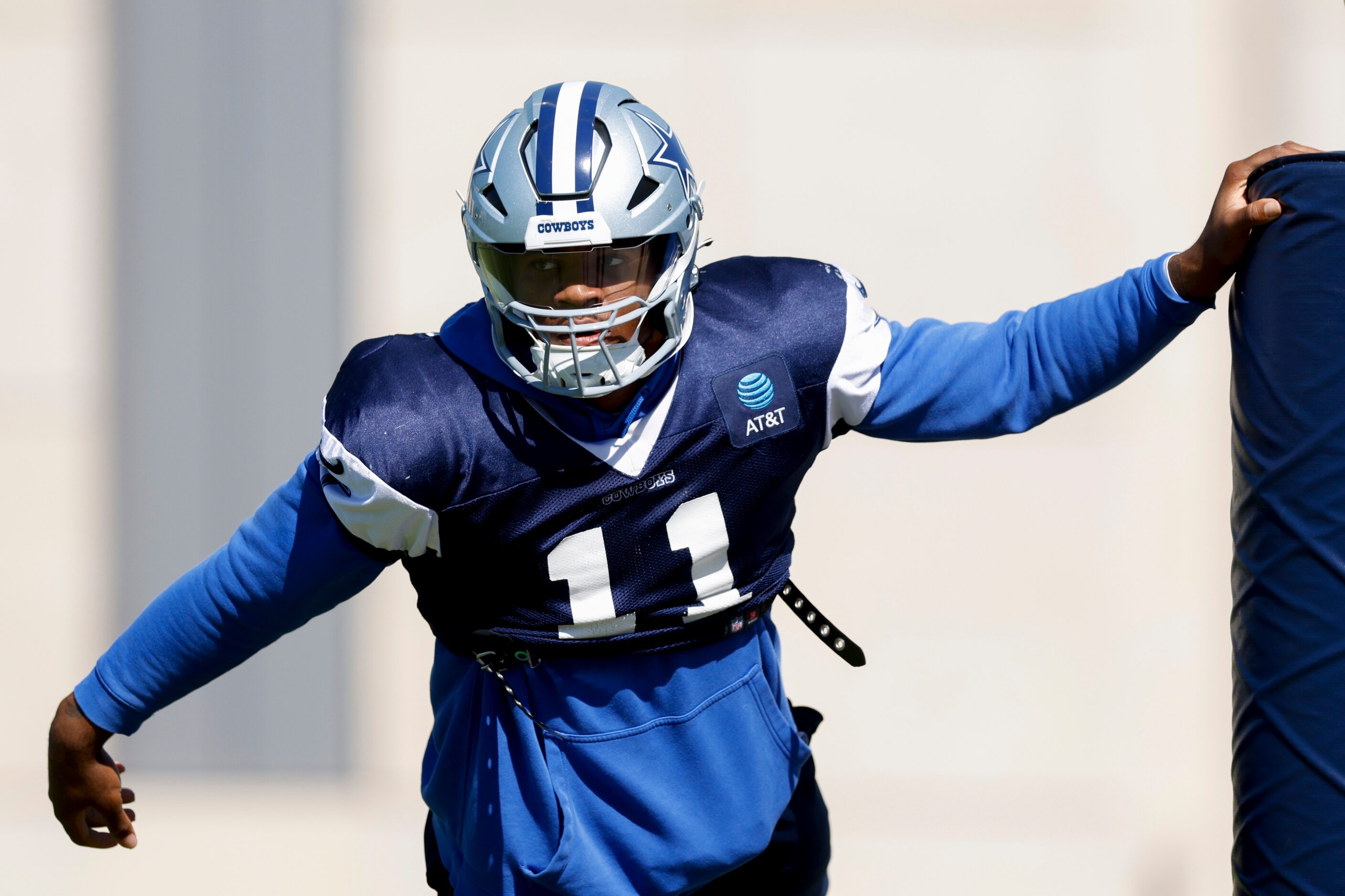 Dallas Cowboys linebacker Micah Parsons (11) stretches during a practice at The Star,...