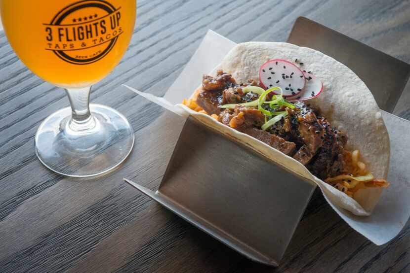 Roughtail Brewing's Everything Rhymes with Orange beer and the Beef Bulgogi taco at 3...