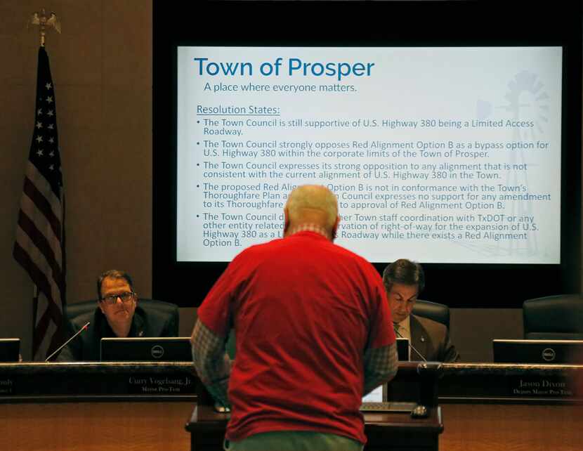Prosper resident Ben Pruett addressed the council as residents crowded into Prosper Town...