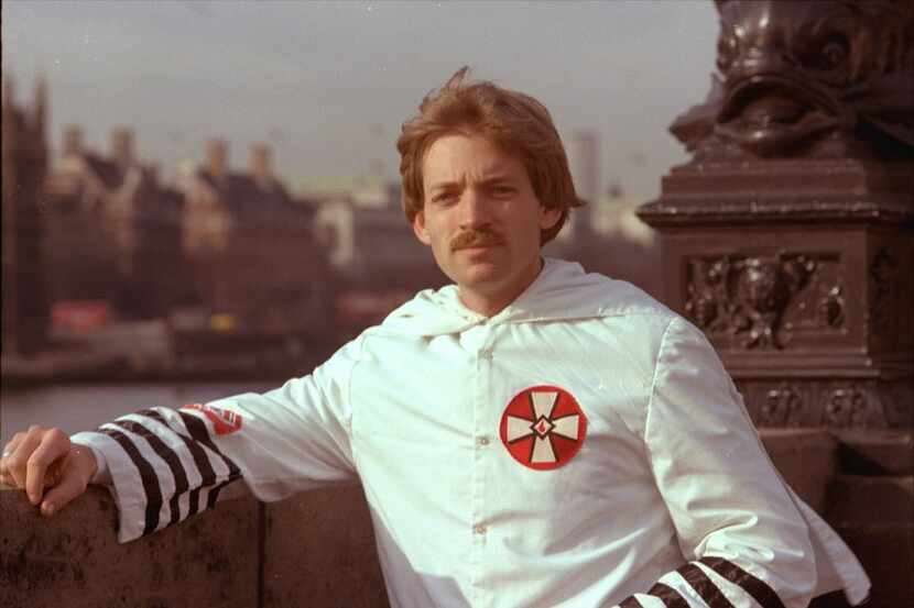 David Duke, 27-year-old Ku Klux Klan leader, poses in his Klan robes in front of the House...
