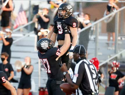 Tight end Jasper Lott (87) celebrates a touchdown by Tito Bryce (9) on the first play of the...