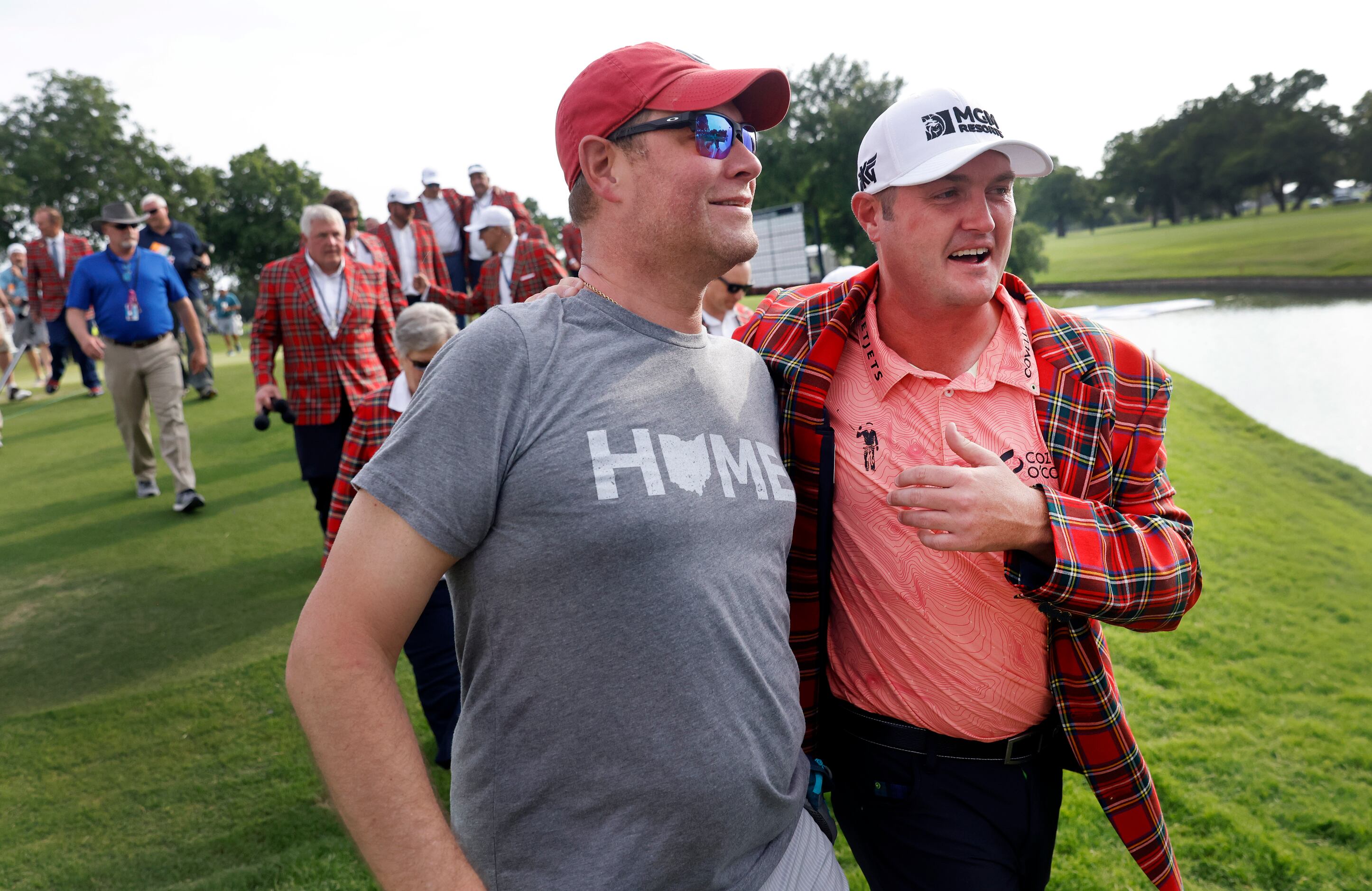 Professional golfer Jason Kokrak (right) celebrates his Charles Schwab Challenge win with...