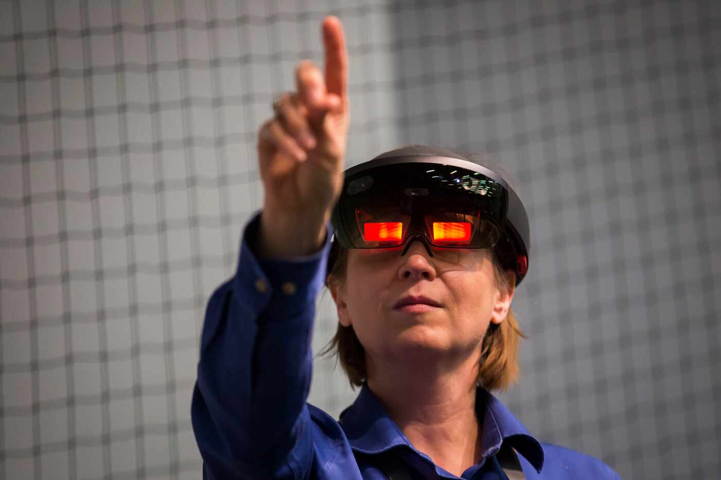 Research scientist Kris Doelling demonstrates the use of Microsoft HoloLens during the 2017...