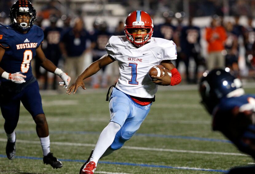 Skyline High's Velton Gardner (1) runs for the team's first touchdown during the first half...