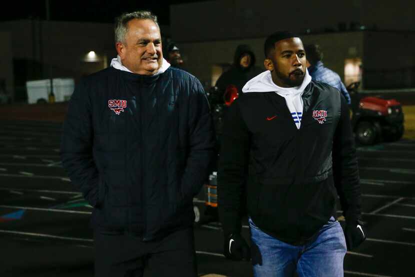 FILE - SMU head football coach Sonny Dykes (left) and running backs coach/recruiting...