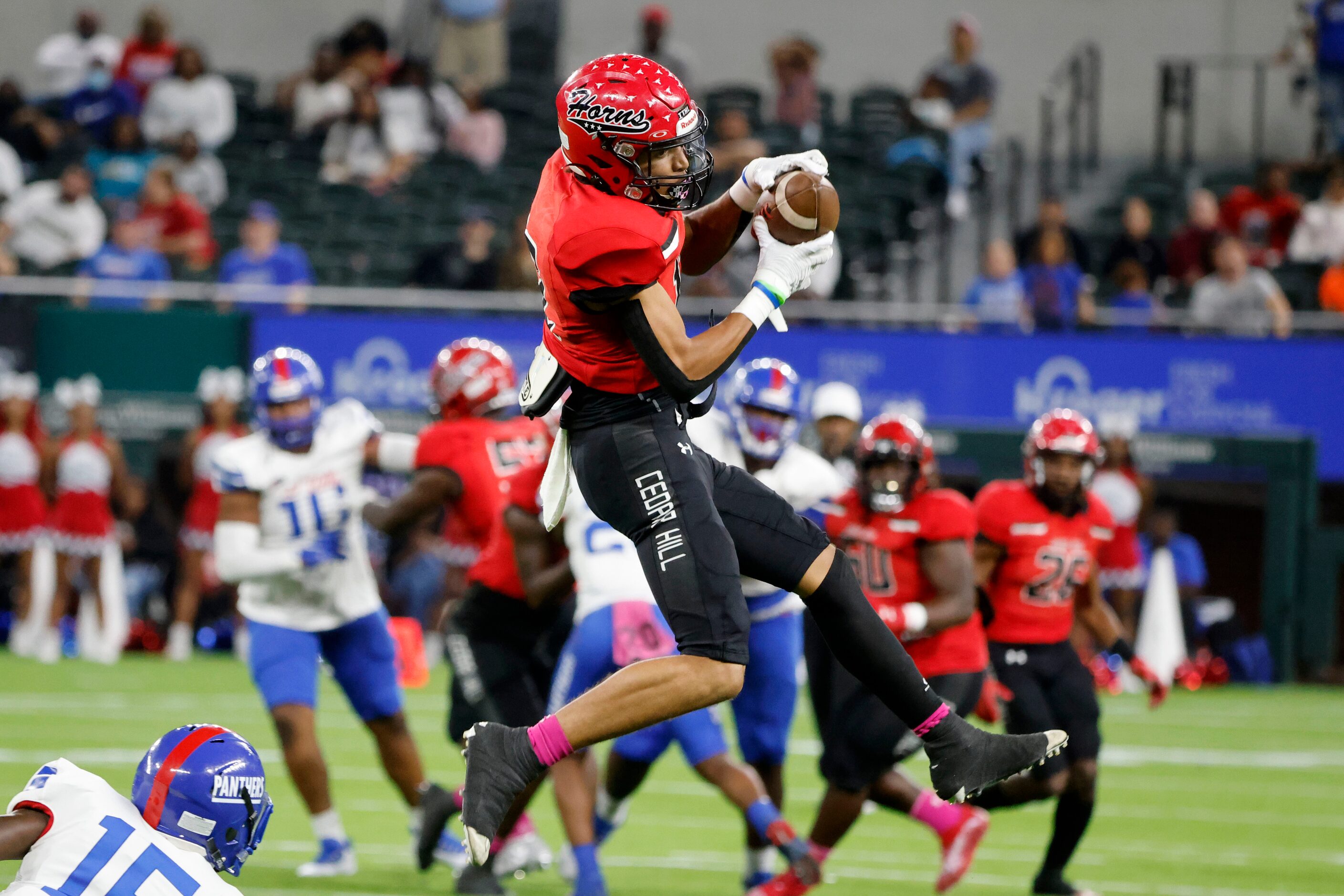 Cedar Hill receiver Miles Rhoden makes a catch against Duncanville during a high school...