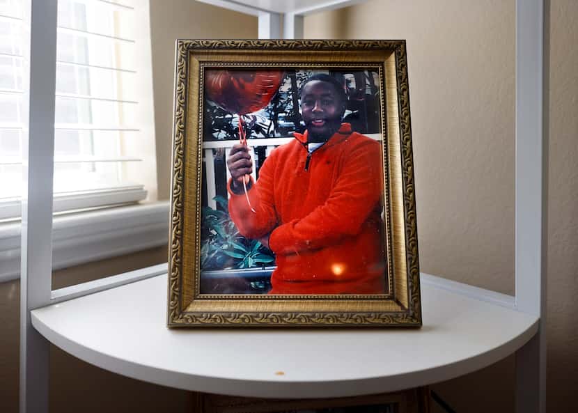 One of the many photos of Dontrell in his mother's family room.  When he was 6 years old,...