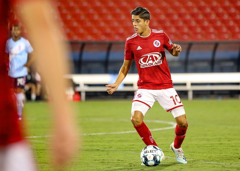 Arturo Rodriguez turns upfield against Forward Madison in the North Texas SC playoff...