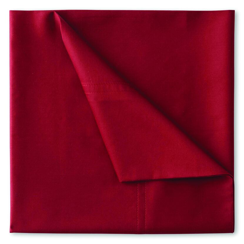 In the mood: Crimson sheets create a romantic environment. Royal Velvet Egyptian cotton...