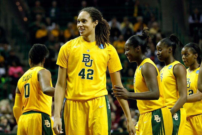Baylor Bears center Brittney Griner (42) is all smiles following her third dunk against the...