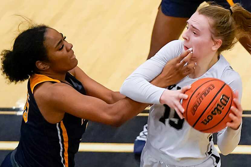 Bishop Lynch guard Paige Bradley (15) gets a hand to the face from Prestonwood Christian...