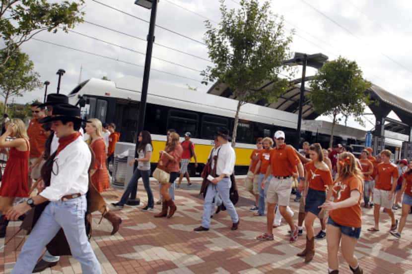 Texas and OU fans get off the Green Line at the MLK Jr. DART Station on Oct. 8, 2011.