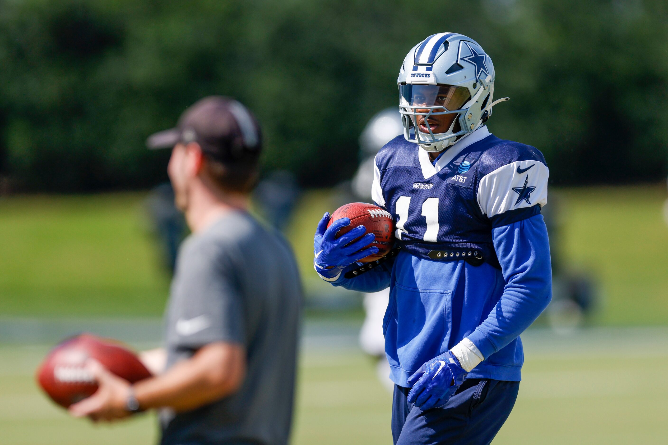 Dallas Cowboys linebacker Micah Parsons (11) trains during a practice at The Star, Thursday,...